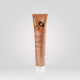 Un tube marron de 100 ml de Crème Colorante avec Ammoniaque, réputée pour son excellent rapport qualité/prix, se dresse debout sur un fond clair. Dahlia Color Professionnel