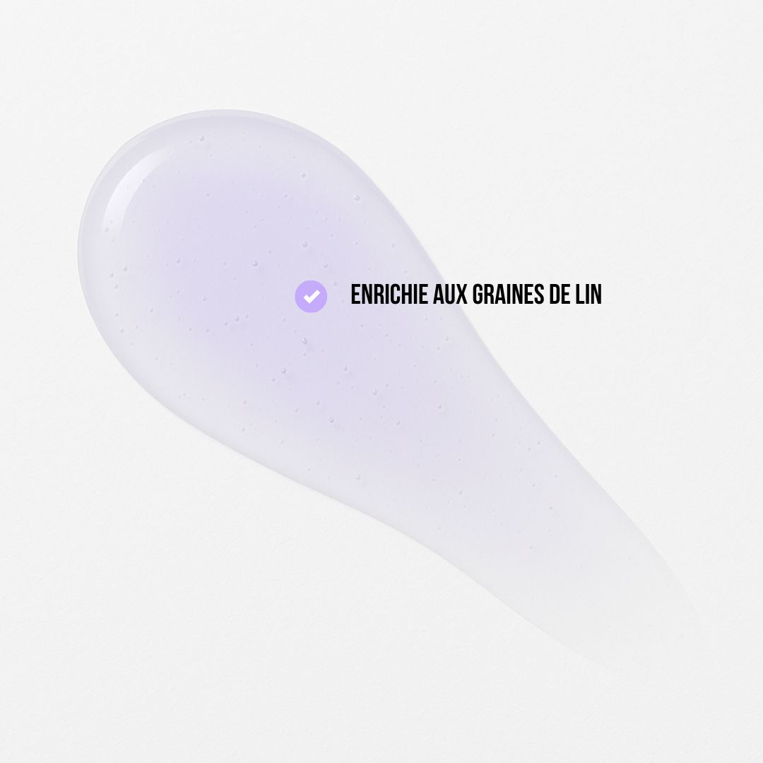 Une goutte de Sérum Fluide aux Graines de Lin F2, avec logo Dahlia Color et check violet—un soin coiffant professionnel à petit prix, réputé pour son excellent rapport qualité/prix. Dahlia Color Professionnel