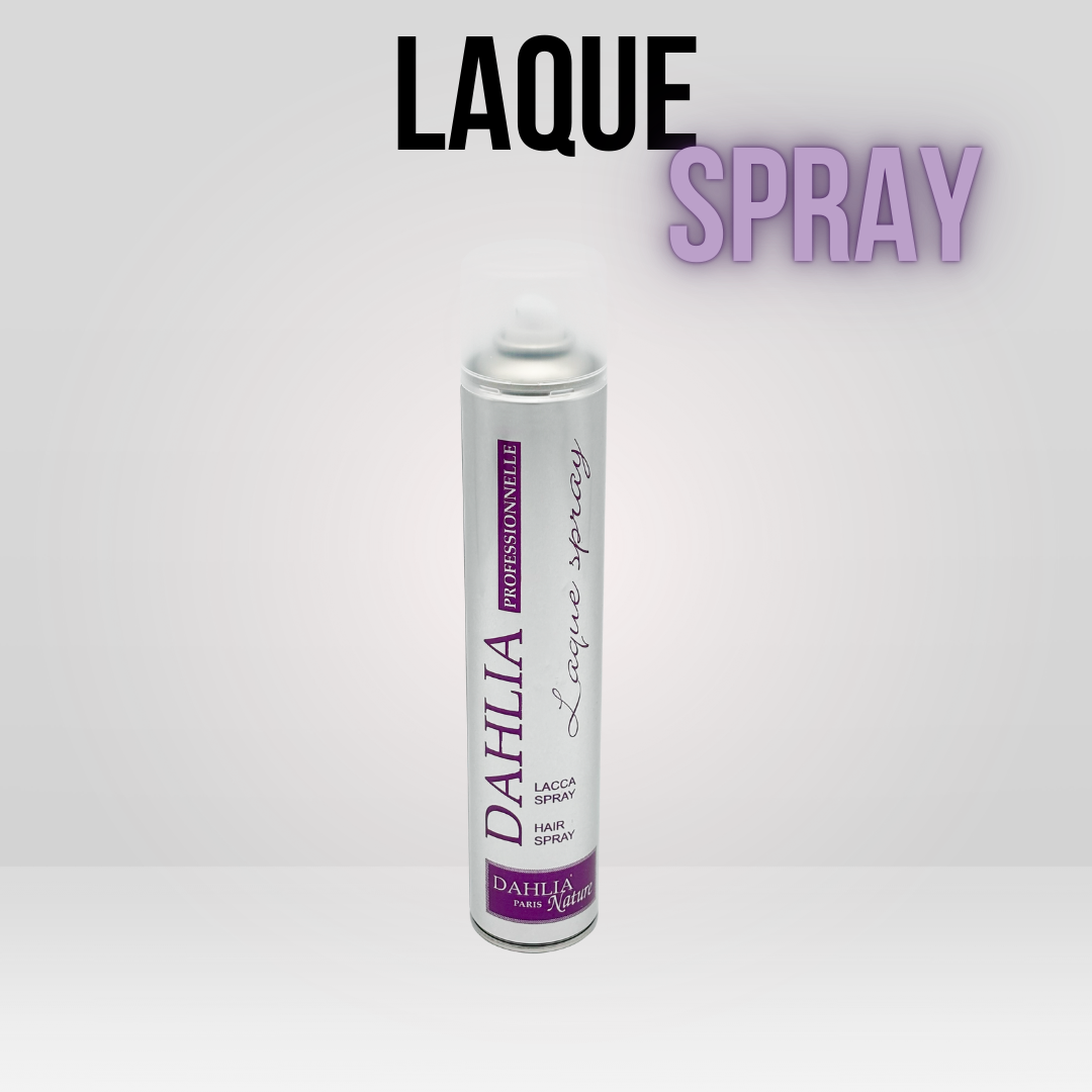 Une canette de Laque spray 500 ml avec le texte en gras "LAQUE SPRAY" au-dessus, un produit de coiffure professionnel abordable offrant un excellent rapport qualité/prix. Dahlia Color Professionnel